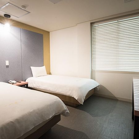 Champion Hotel Jeju Bagian luar foto